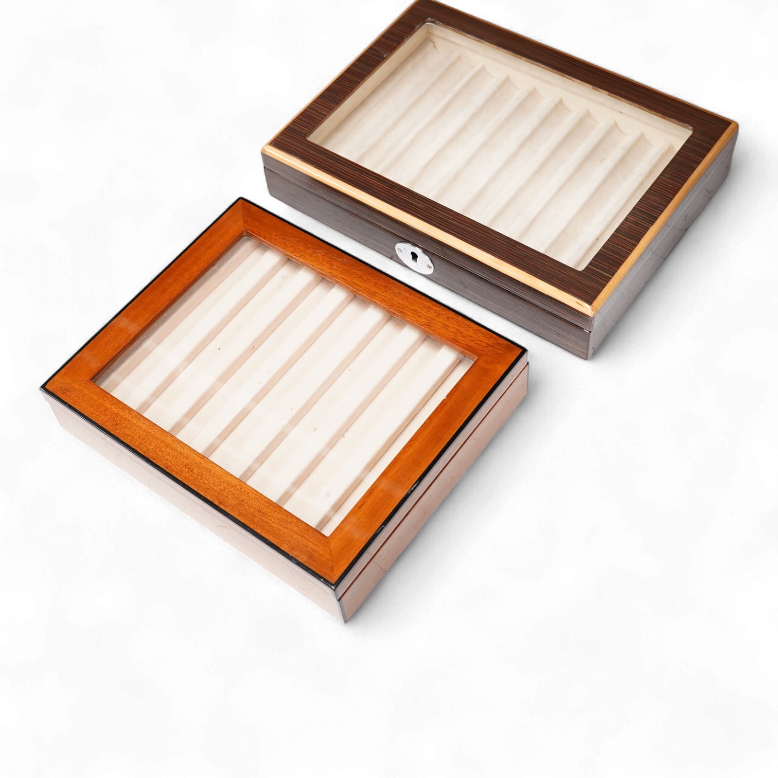 A pair of quality fountain pen desk top cabinets to hold ten and seven pens respectively